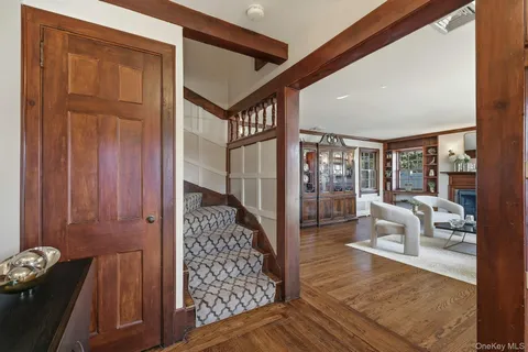 a living room with furniture and a gate