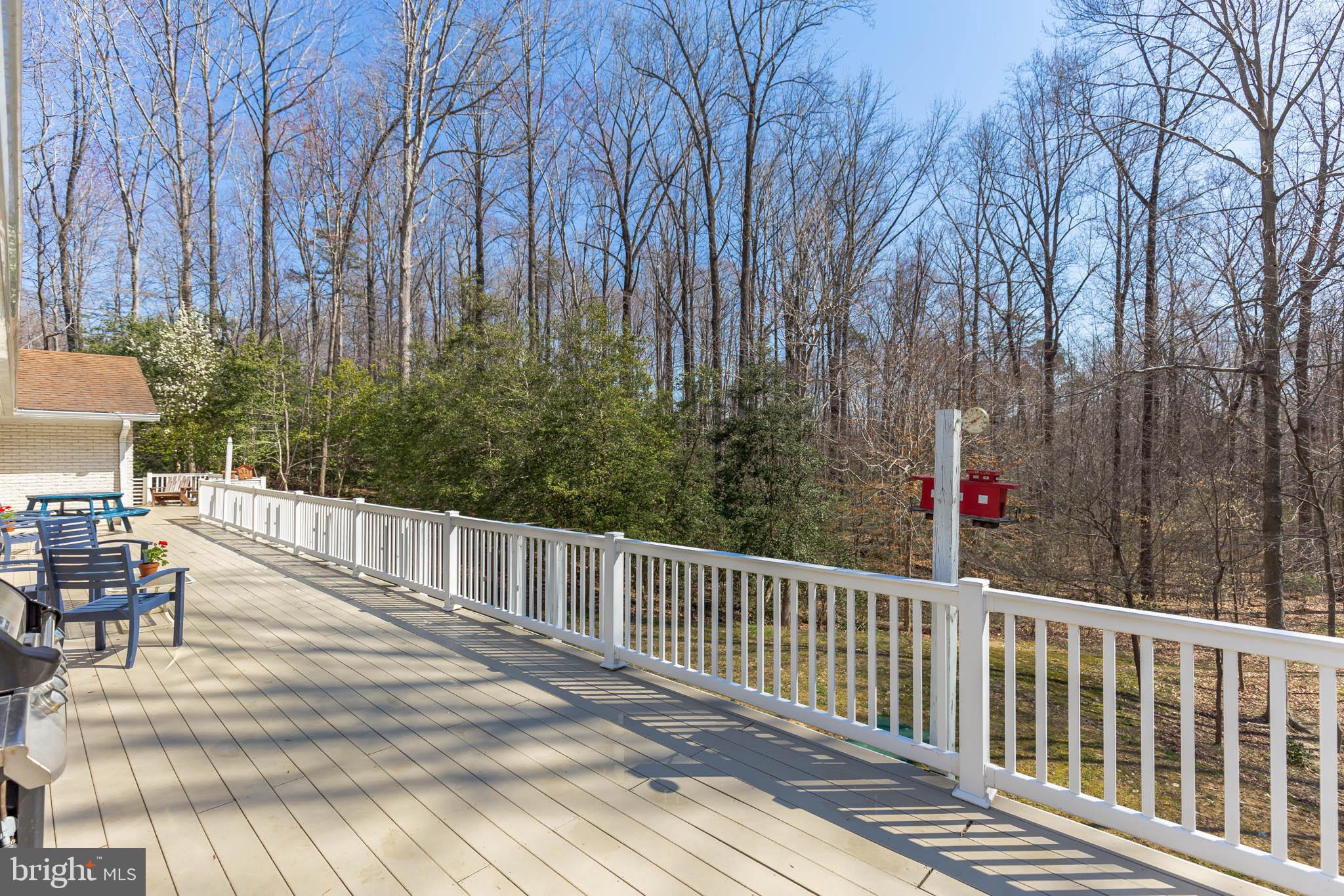 10311 3 Doctors Road Dunkirk, MD 20754 - Photo 17 of 31 Large Deck that Covers the Length of the House!
