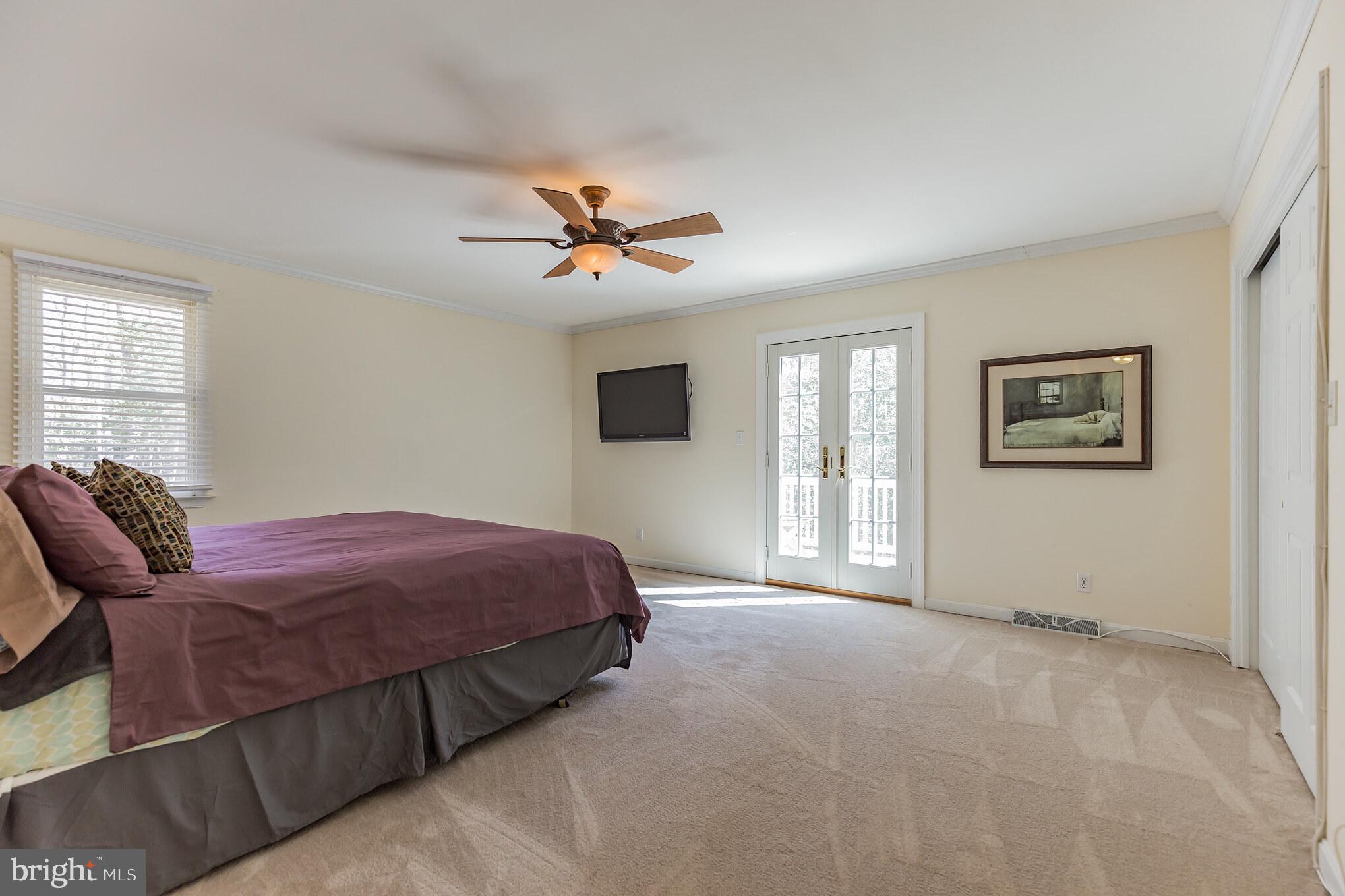 10311 3 Doctors Road Dunkirk, MD 20754 - Photo 18 of 31 Spacious Owners Suite w/ Walkout to Deck