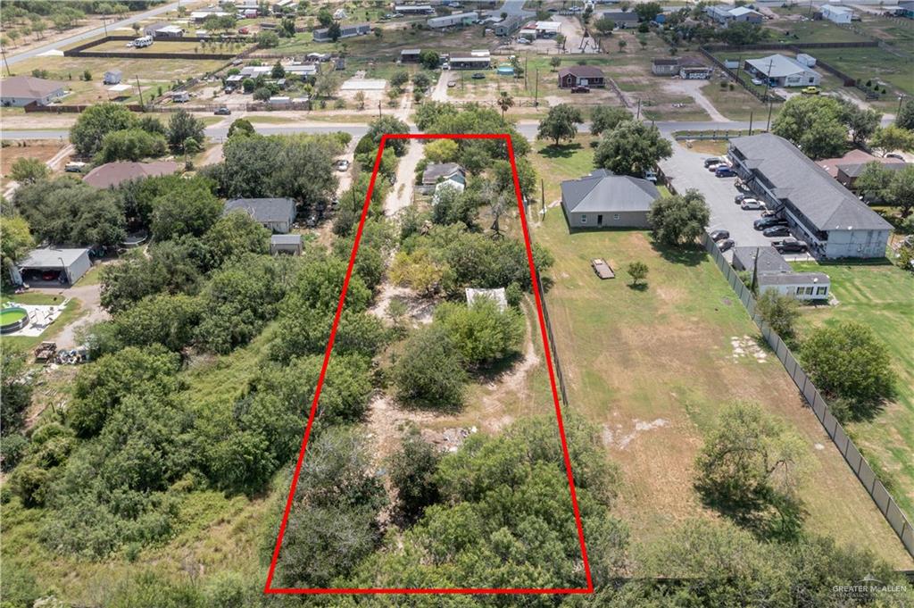 2713 South Midway Road Weslaco, TX 78596 - Photo 15 of 17 an aerial view of residential houses with outdoor space