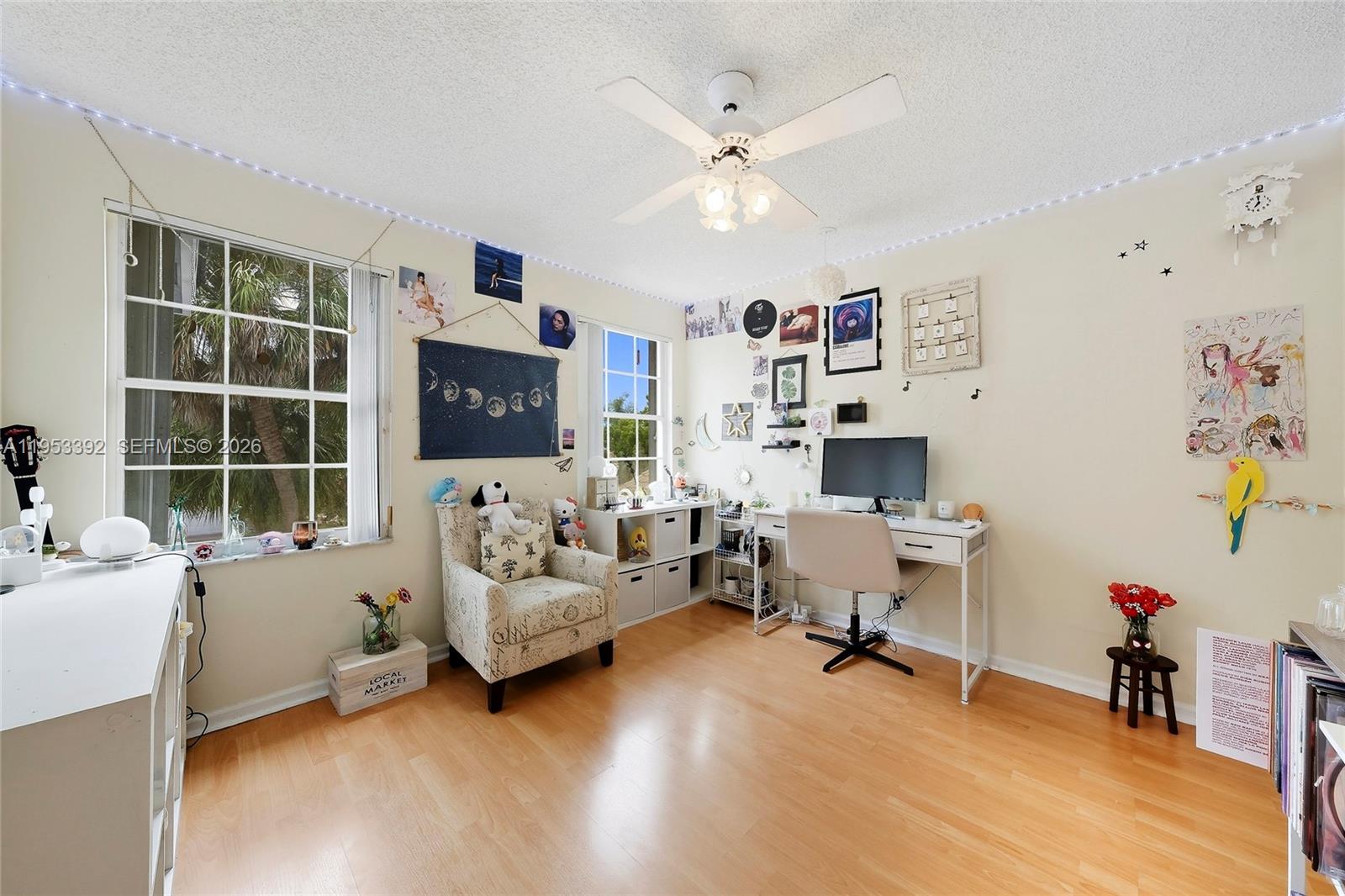 15025 Southwest 19th Court Miramar, FL 33027 - Photo 20 of 27 a living room with furniture and a large window