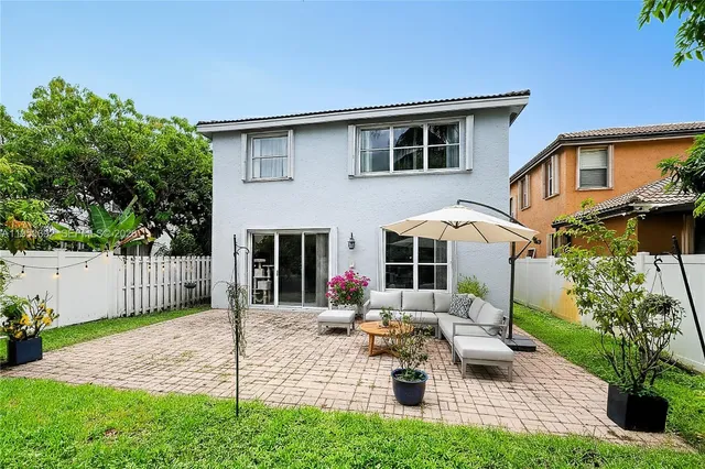 a front view of a house with patio