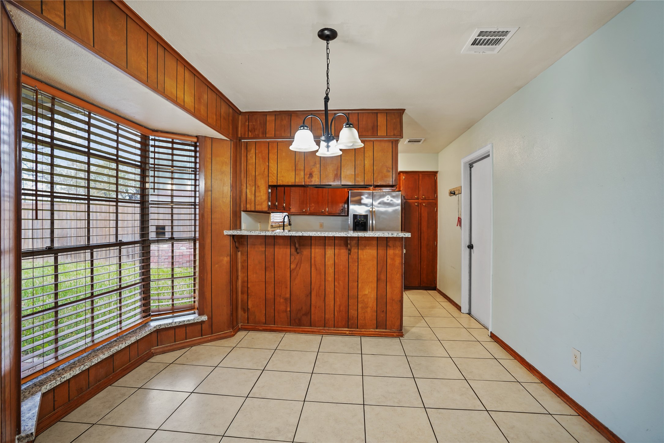 623 Rockbrook Drive Houston, TX 77015 - Photo 4 of 17 a view of a kitchen with a sink and windows