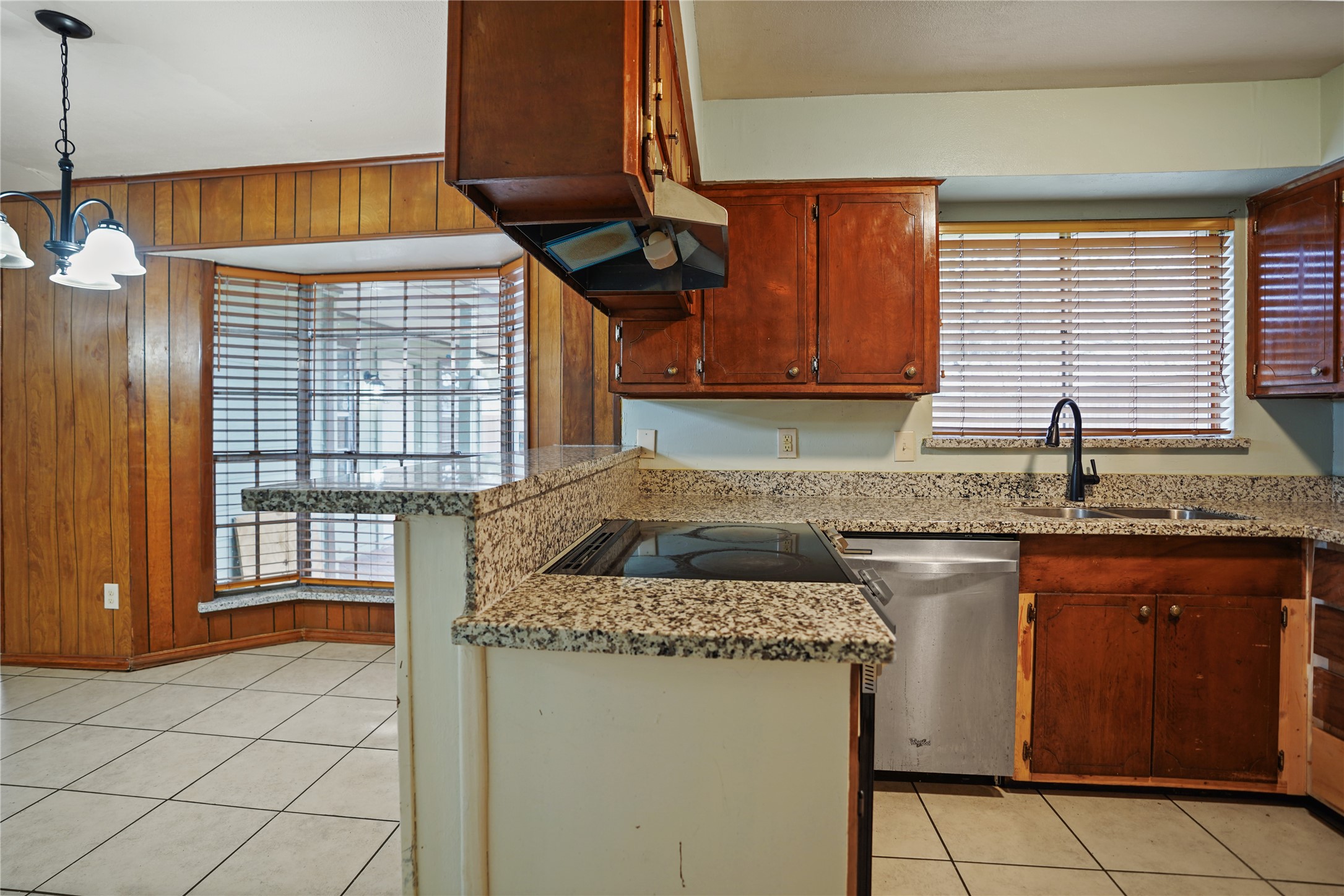 623 Rockbrook Drive Houston, TX 77015 - Photo 5 of 17 a kitchen with granite countertop a sink and a stove