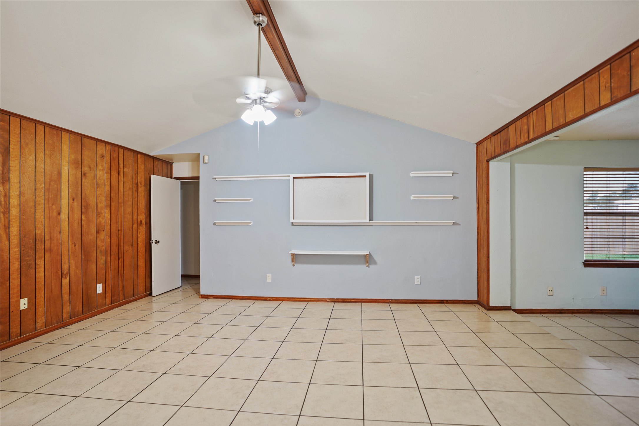 623 Rockbrook Drive Houston, TX 77015 - Photo 9 of 17 a view of an empty room and window