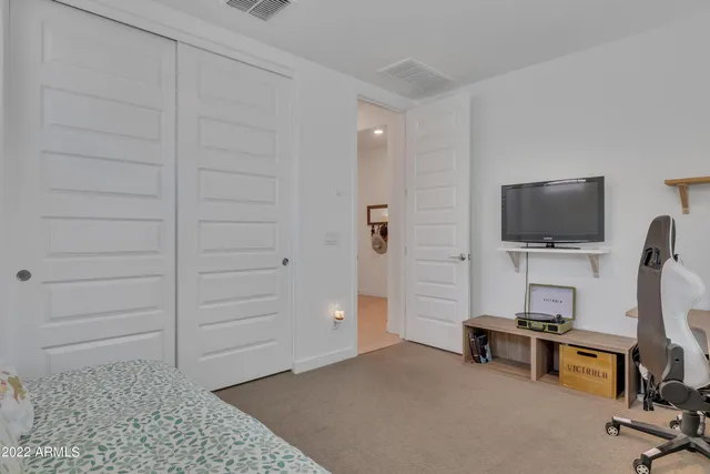 a view of a workspace with furniture