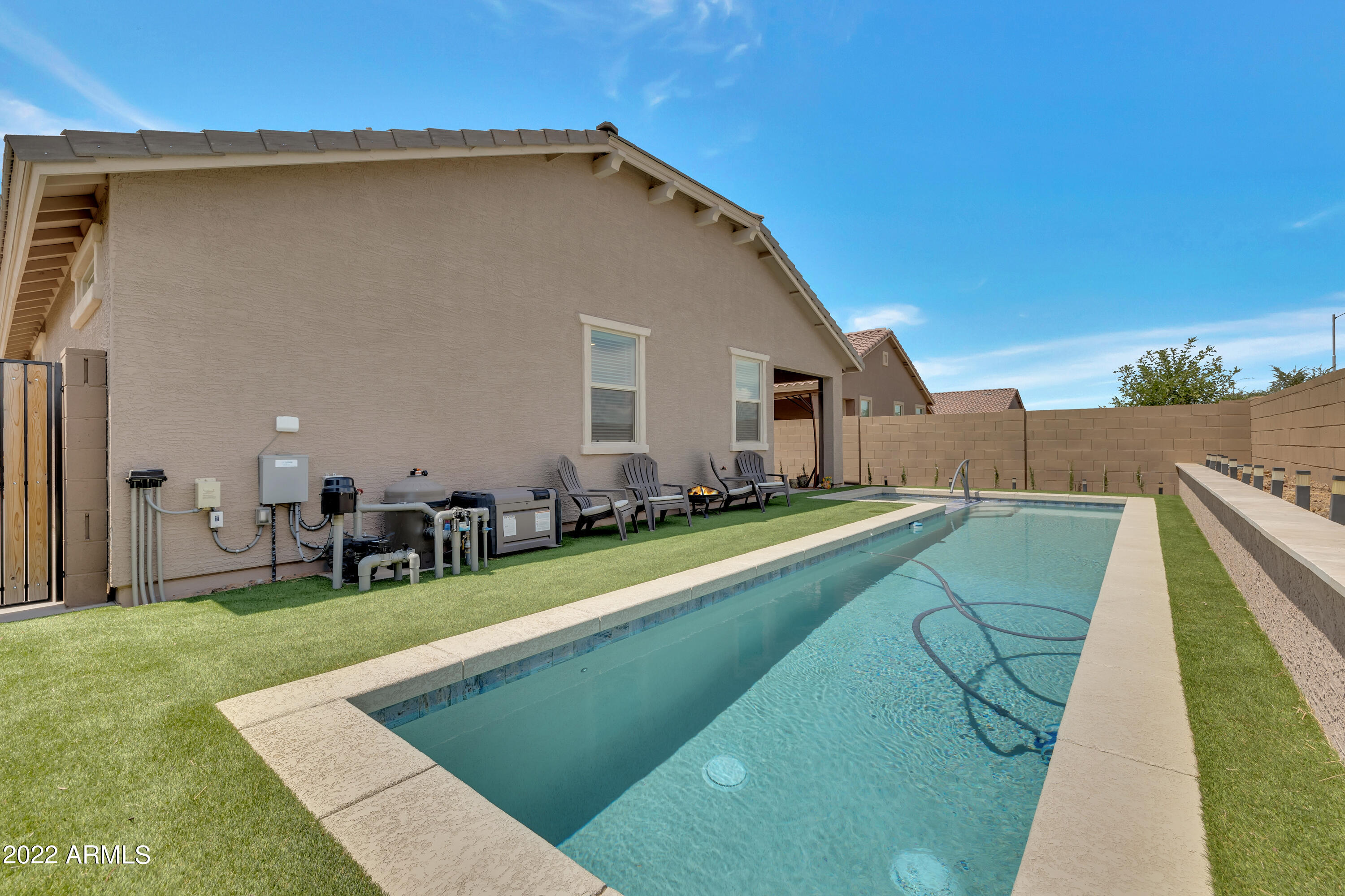9630 West Atlantis Way Tolleson, AZ 85353 - Photo 37 of 37 a view of a house with swimming pool