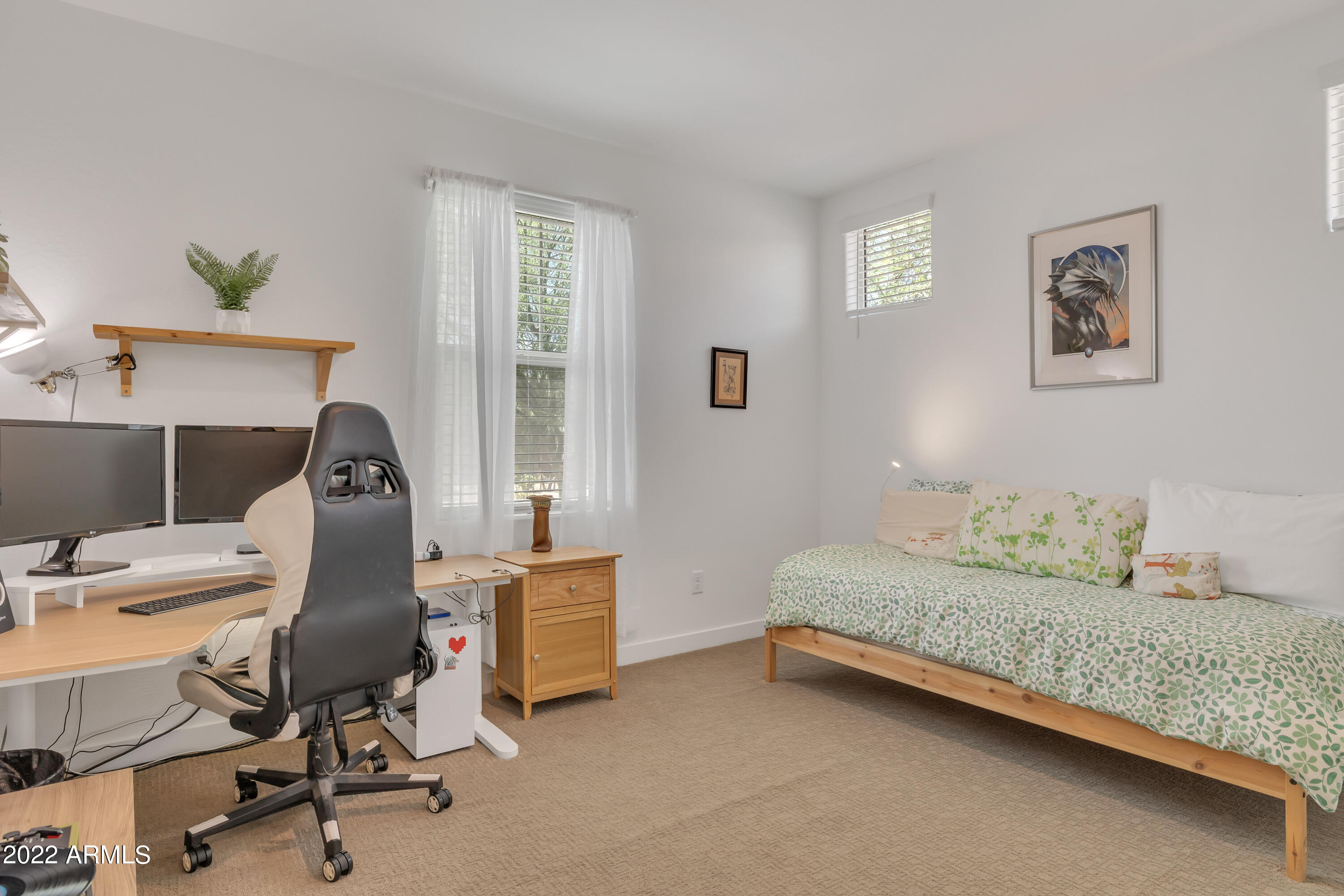 9630 West Atlantis Way Tolleson, AZ 85353 - Photo 10 of 37 a bedroom with a workspace