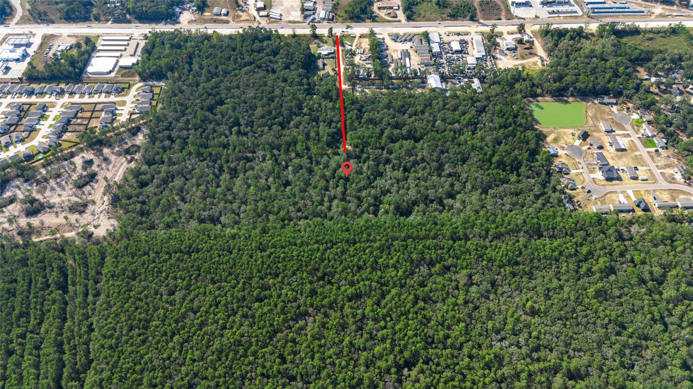 105 E/ Crowson Ridge Road Conroe, TX 77306 - Photo 15 of 16 a view of a city