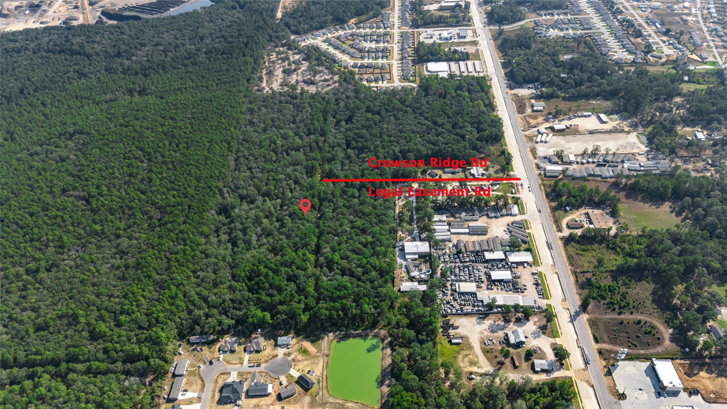 105 E/ Crowson Ridge Road Conroe, TX 77306 - Photo 10 of 16 an aerial view of multiple house