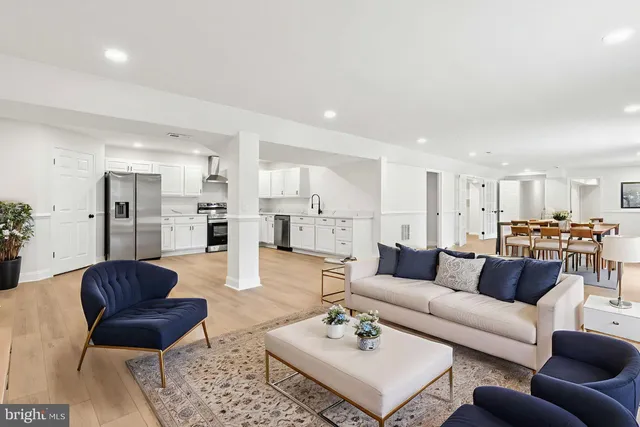a view of living room kitchen with furniture and a table