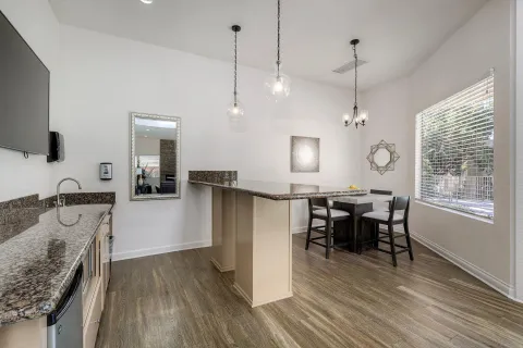 a view of a kitchen and dining room