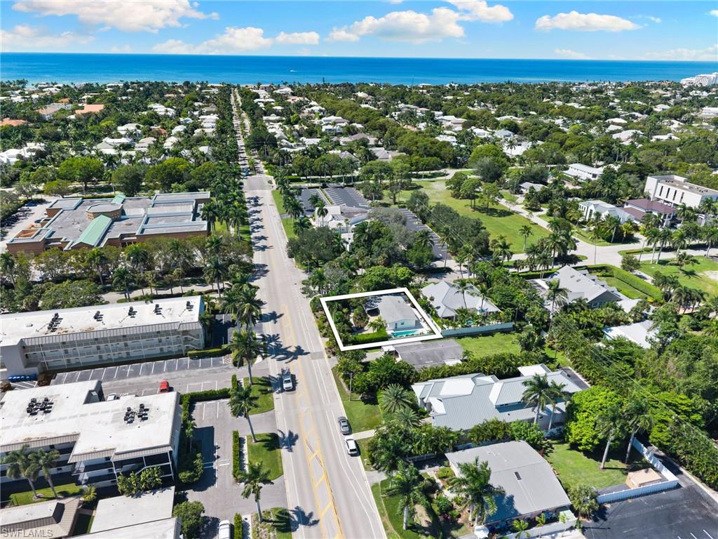 725 Central Avenue Naples, FL 34102 - Photo 6 of 10 an aerial view of residential houses with outdoor space