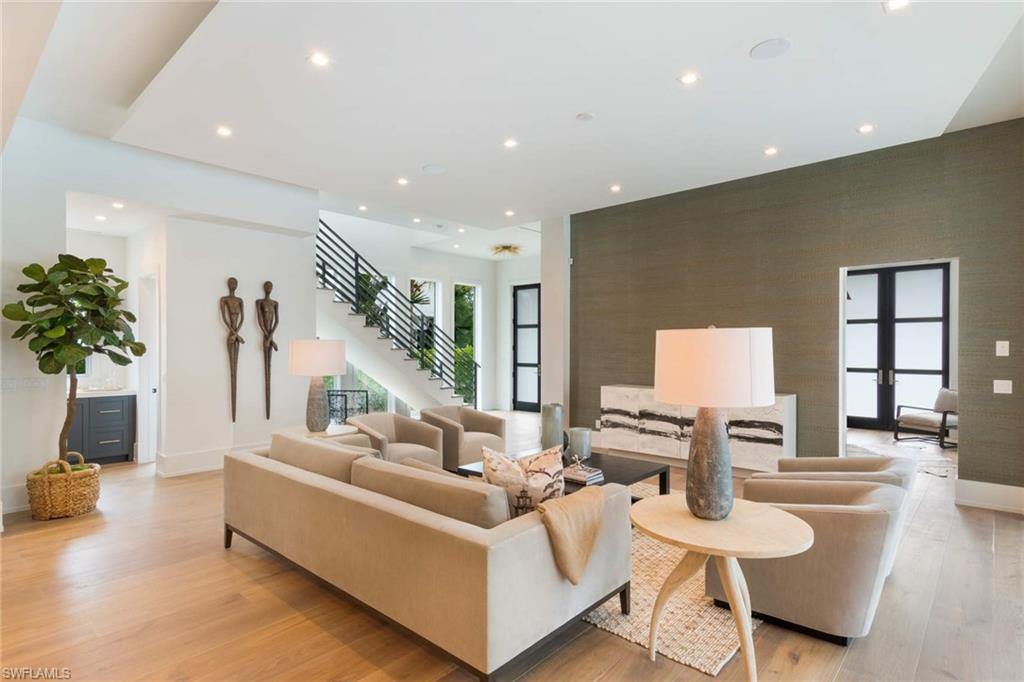 1430 Crayton Road Naples, FL 34102 - Photo 4 of 34 a living room with furniture
