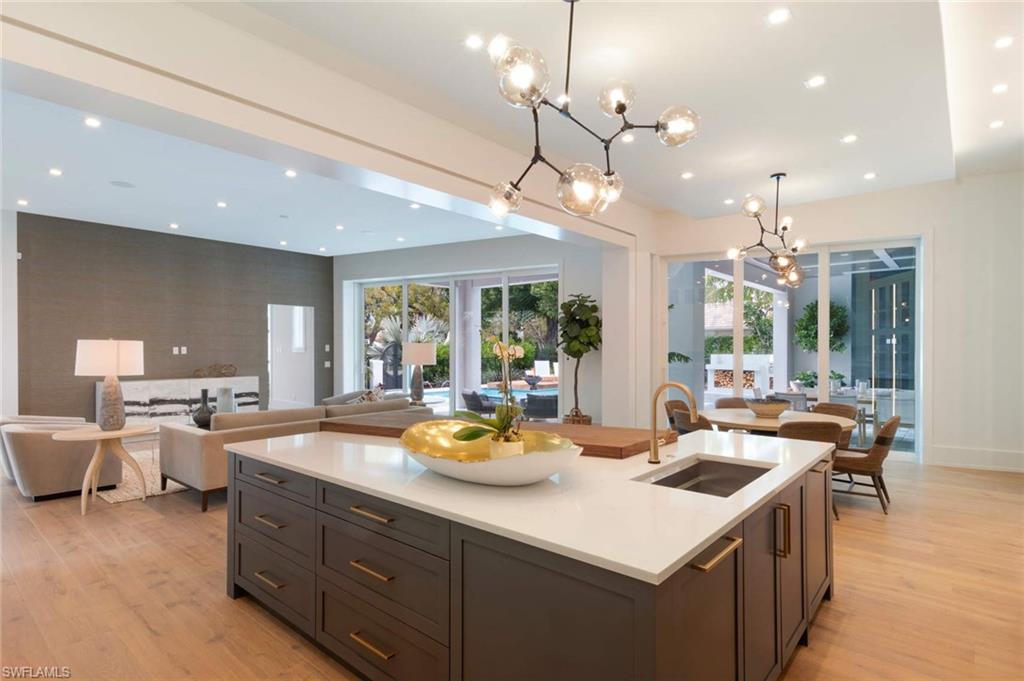 1430 Crayton Road Naples, FL 34102 - Photo 7 of 34 a kitchen with lots of counter top space