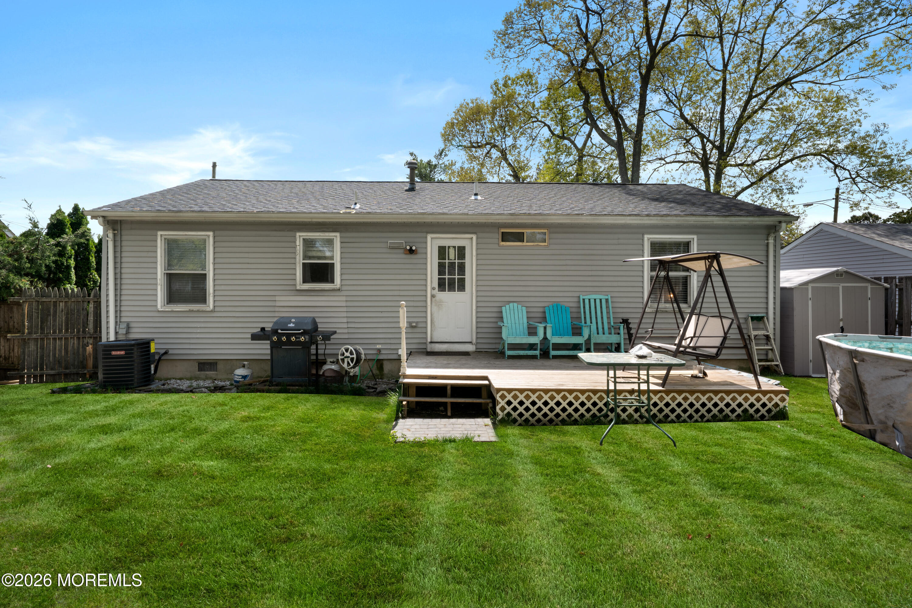 612 Nantucket Road Forked River, NJ 08731 - Photo 16 of 22 a view of a house with a yard porch and sitting area
