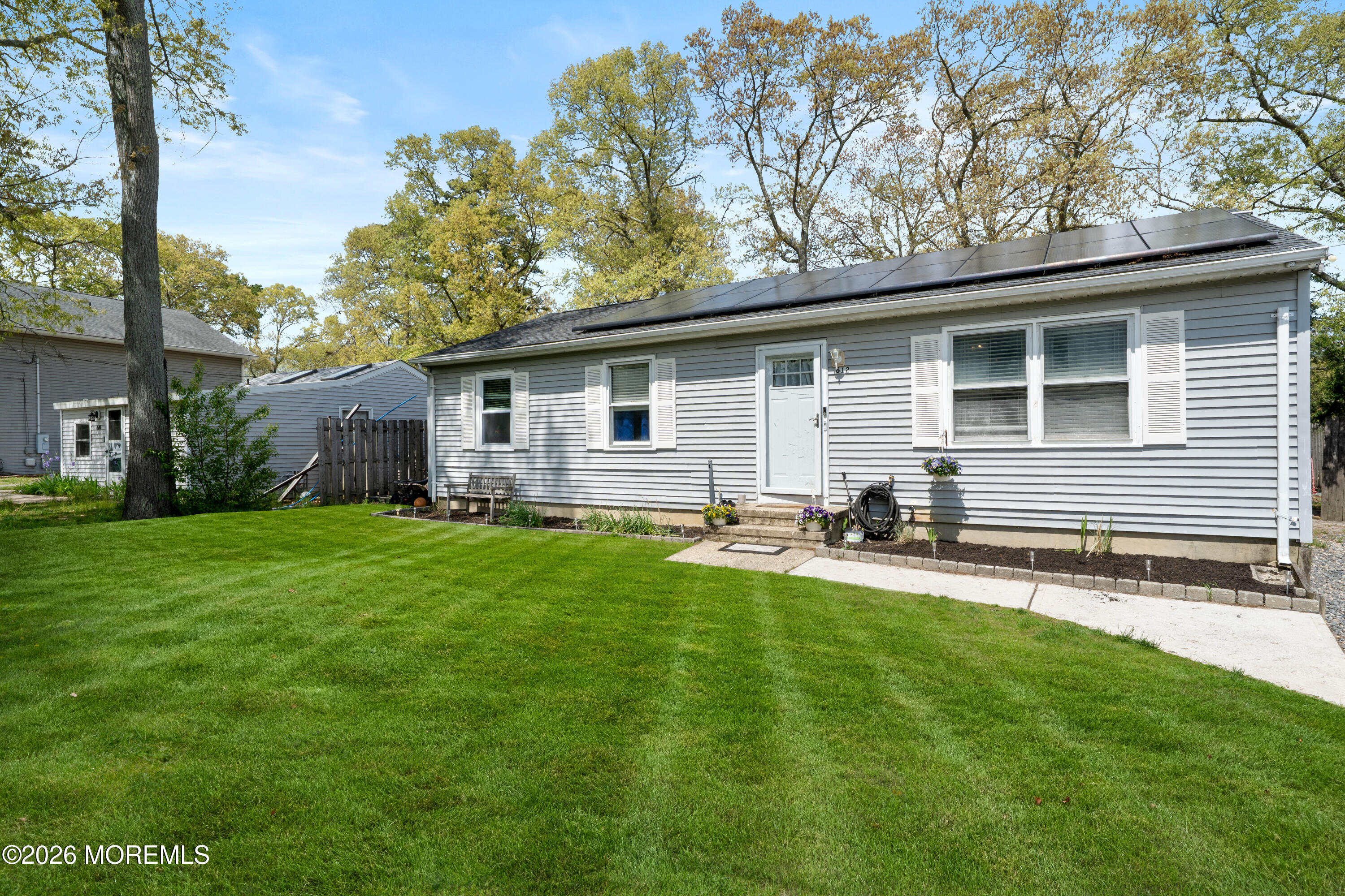 612 Nantucket Road Forked River, NJ 08731 - Photo 2 of 22 a house view with a garden space