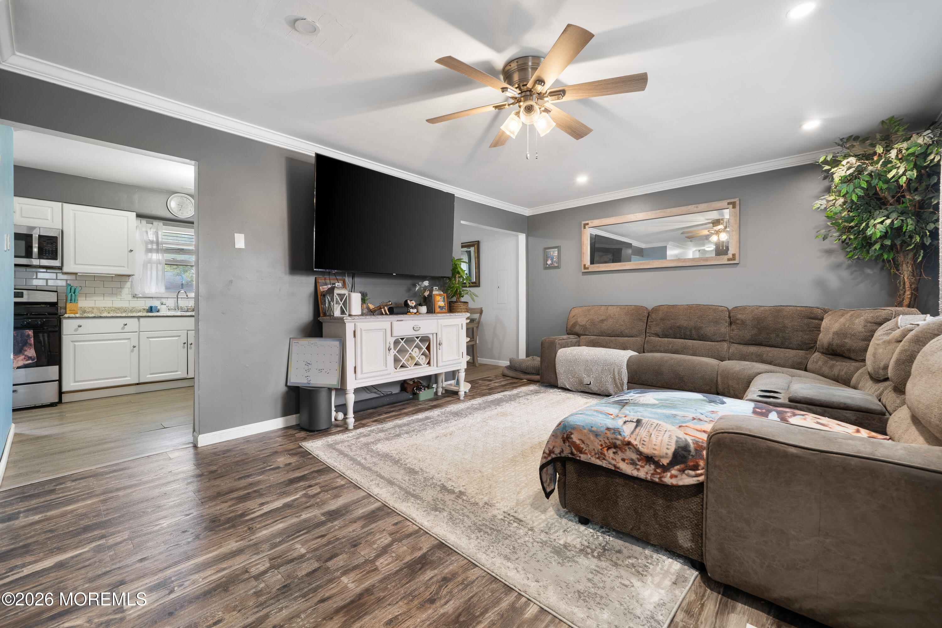 612 Nantucket Road Forked River, NJ 08731 - Photo 3 of 22 a living room with furniture and a flat screen tv