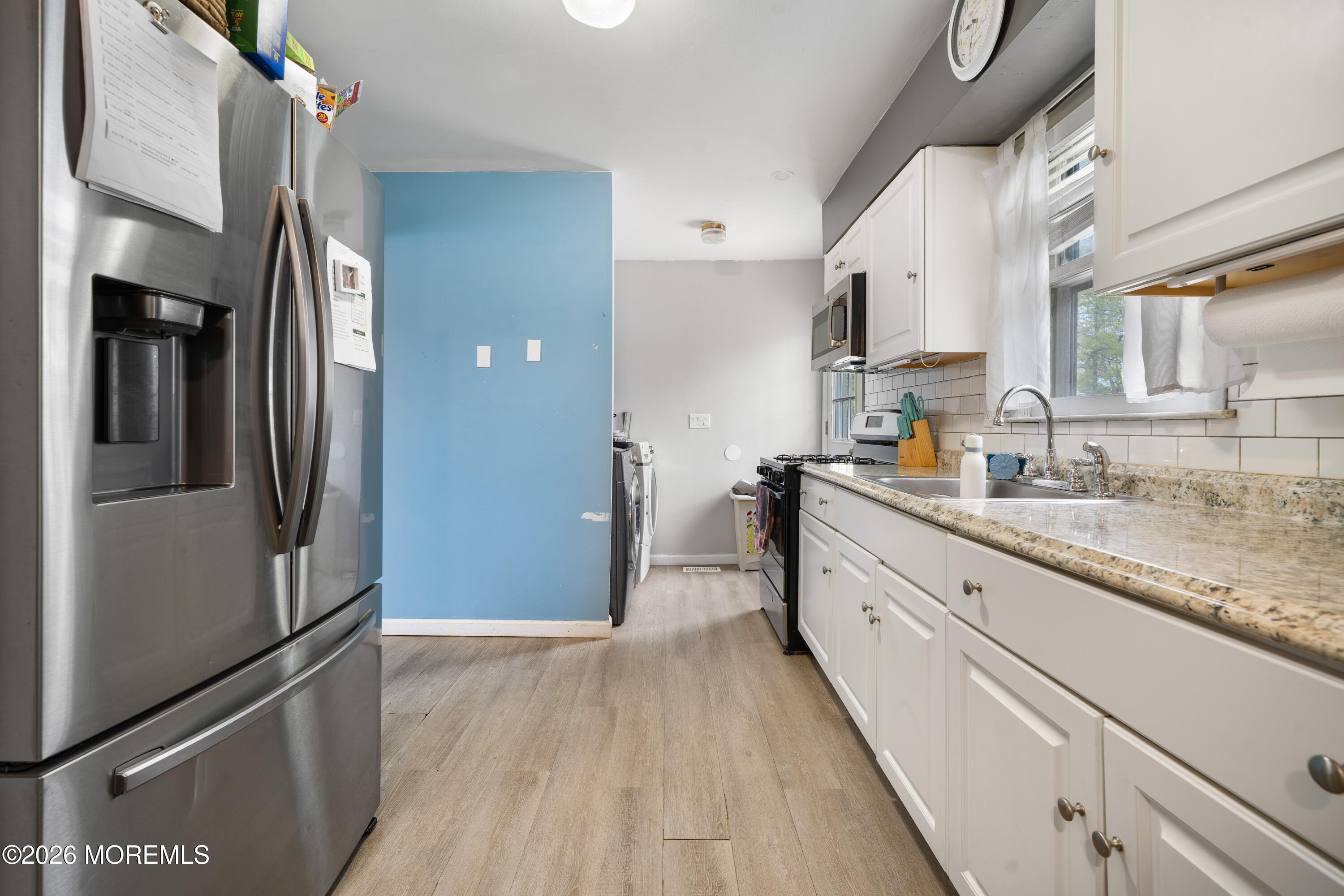 612 Nantucket Road Forked River, NJ 08731 - Photo 6 of 22 a large kitchen with stainless steel appliances granite countertop a refrigerator and a sink