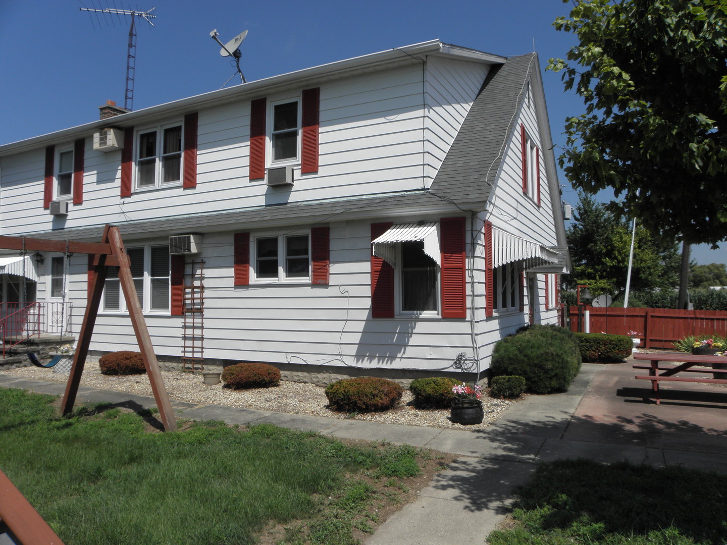 4060 South Old Mazon Road Mazon, IL 60444 - Photo 3 of 37 a front view of a house with a yard