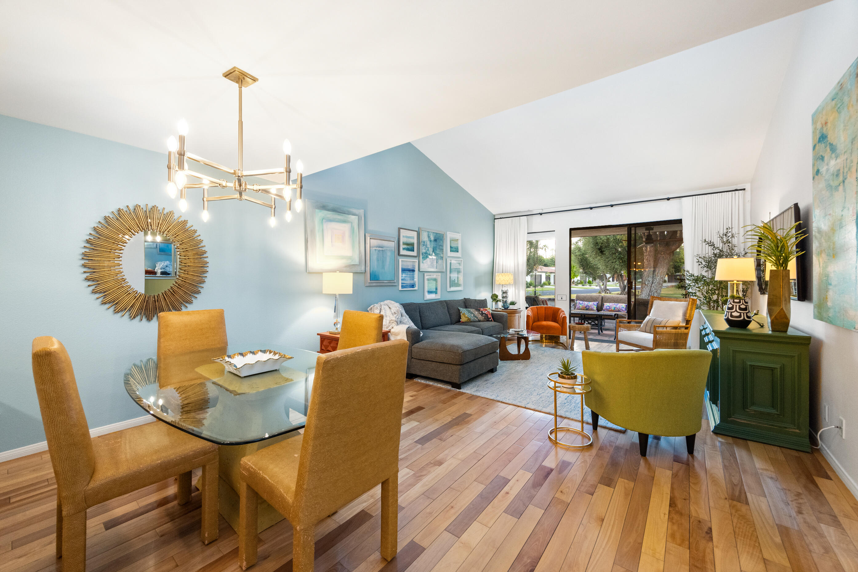 60 El Toro Drive Rancho Mirage, CA 92270 - Photo 11 of 38 a living room with furniture and wooden floor
