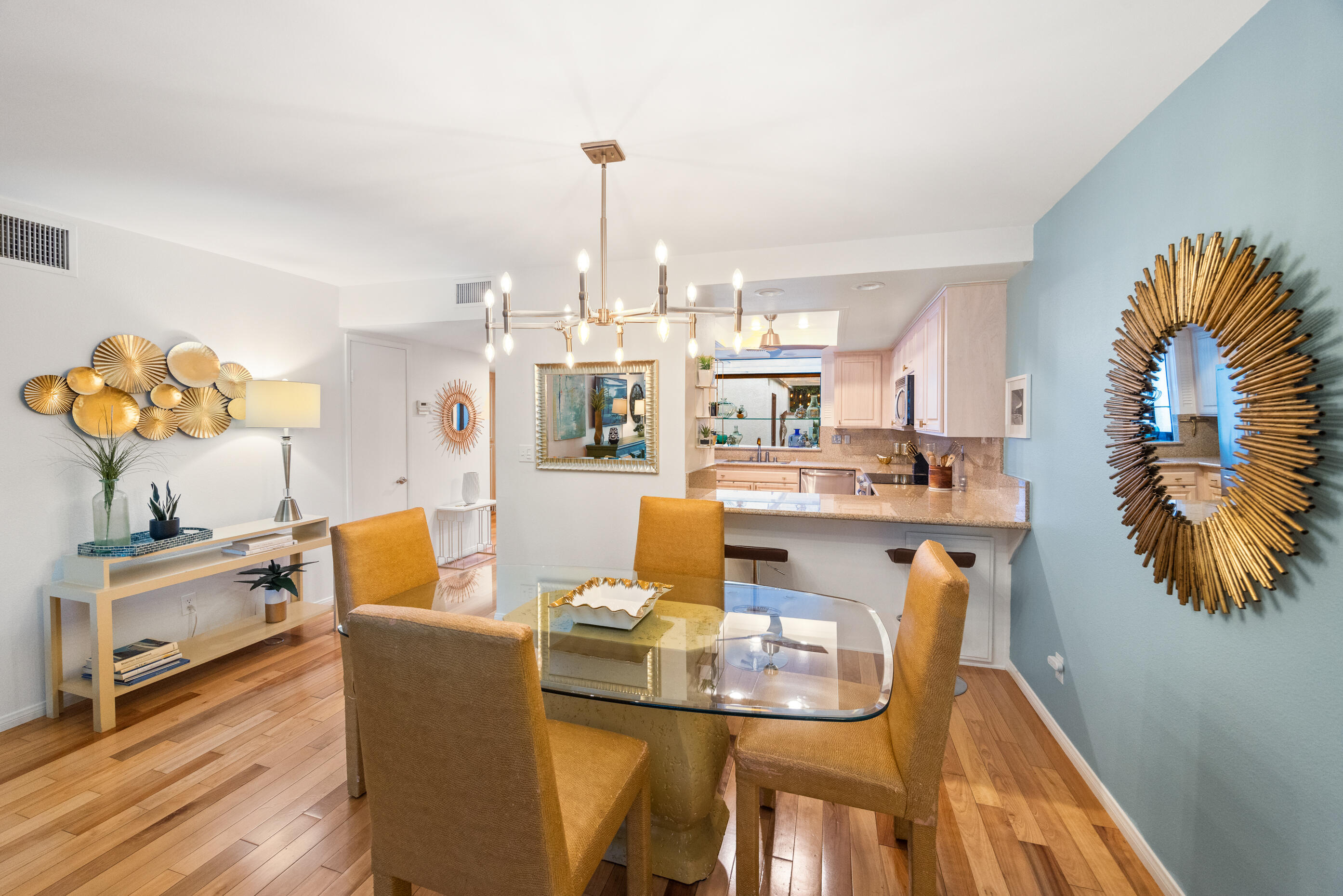 60 El Toro Drive Rancho Mirage, CA 92270 - Photo 12 of 38 a living room with kitchen island furniture and a wooden floor