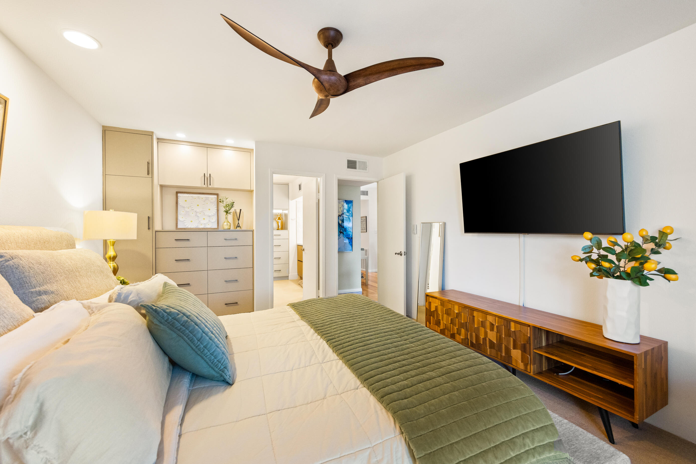 60 El Toro Drive Rancho Mirage, CA 92270 - Photo 17 of 38 a bedroom with a bed and a flat screen tv