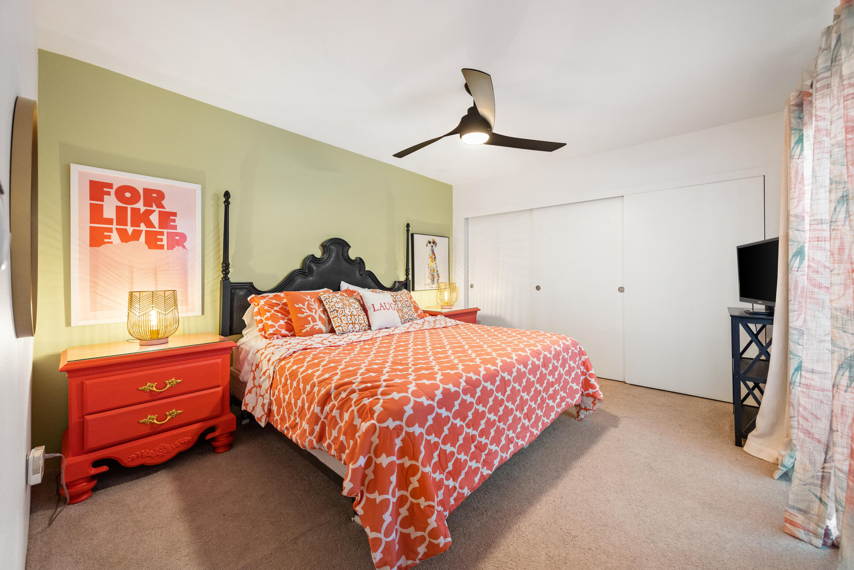 60 El Toro Drive Rancho Mirage, CA 92270 - Photo 23 of 38 a bedroom with a bed and a chandelier