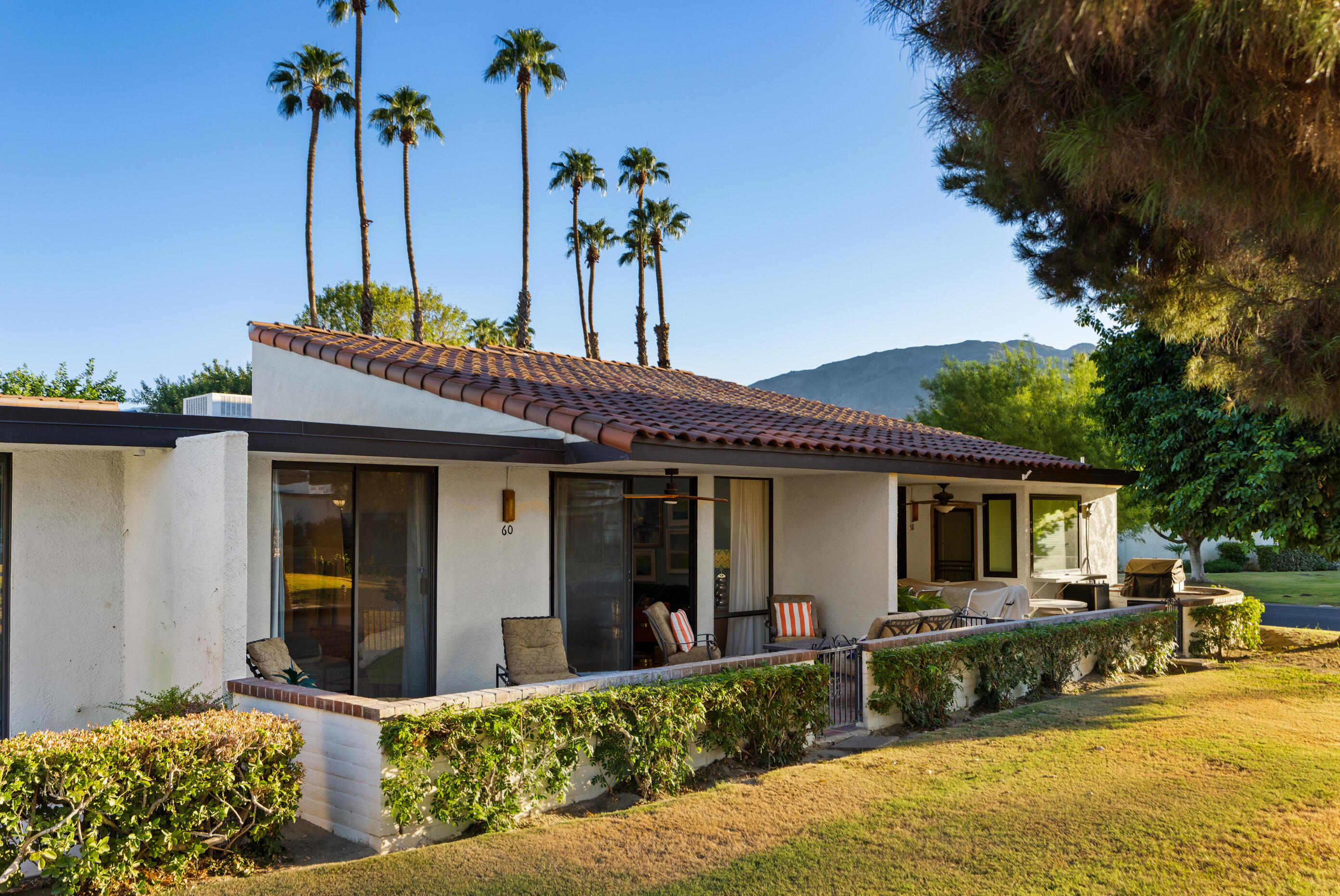 60 El Toro Drive Rancho Mirage, CA 92270 - Photo 31 of 38 a house view with a garden space
