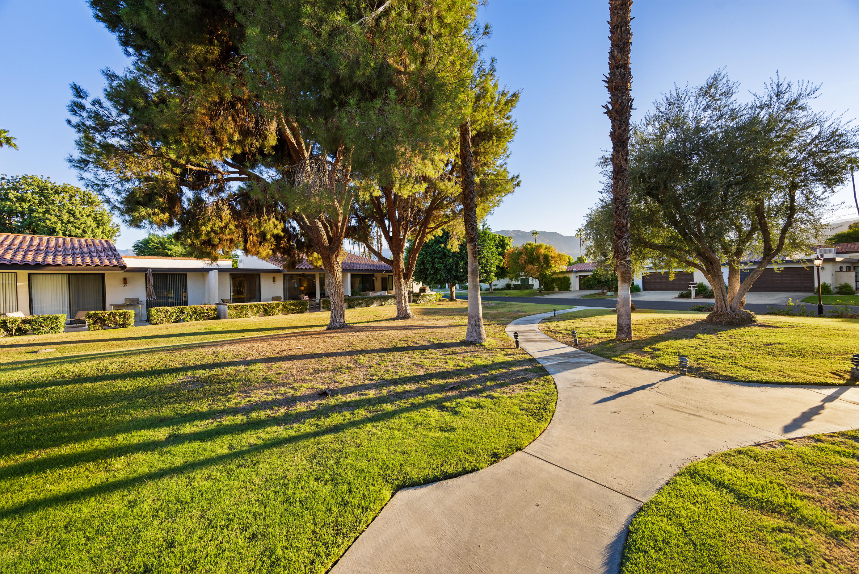 60 El Toro Drive Rancho Mirage, CA 92270 - Photo 38 of 38 a swimming pool with outdoor seating and yard