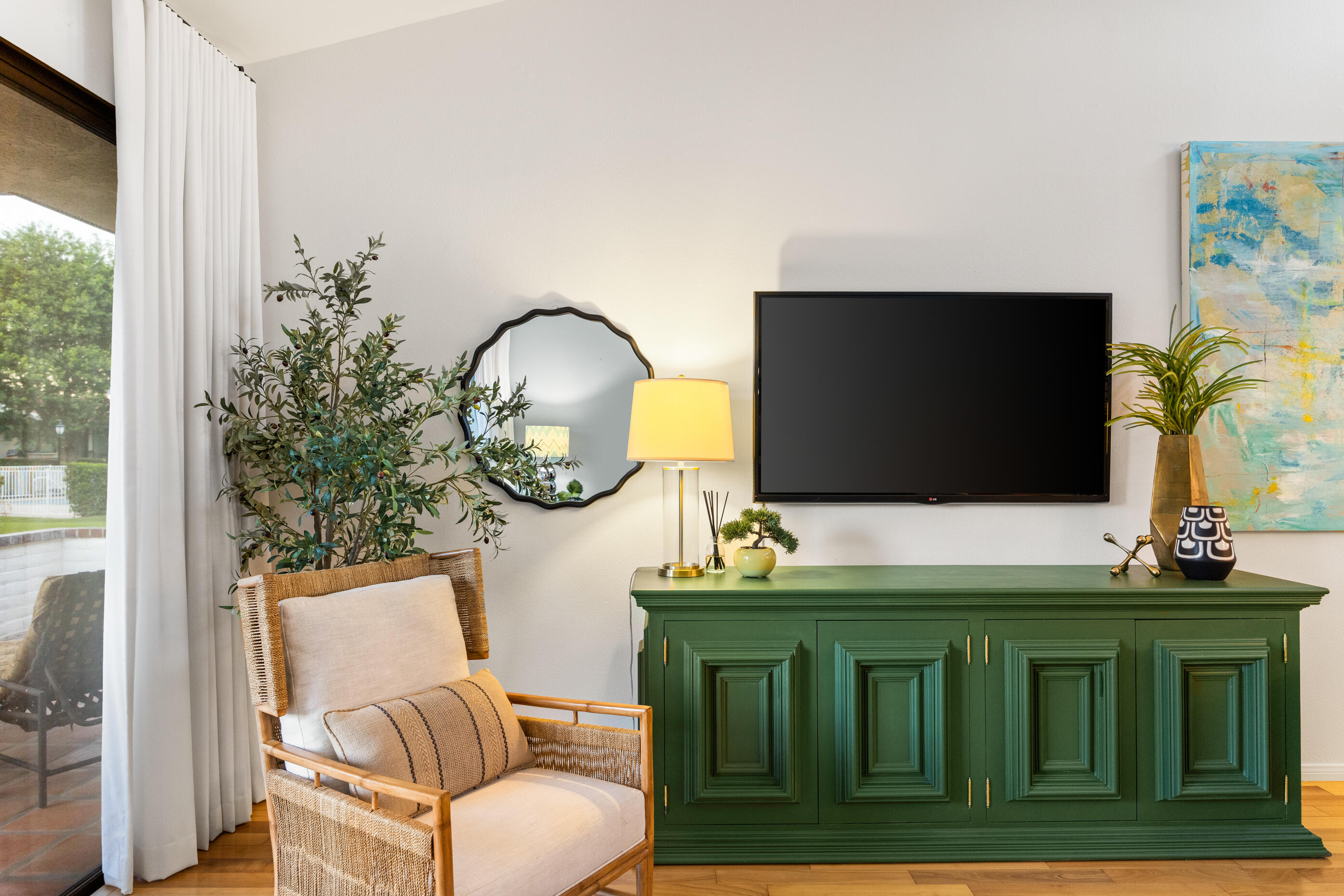 60 El Toro Drive Rancho Mirage, CA 92270 - Photo 5 of 38 a living room with furniture and a flat screen tv