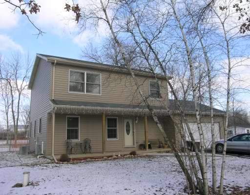 5510 West Hilltop Road Monee, IL 60449 - Photo 1 of 1 a front view of a house with parking space