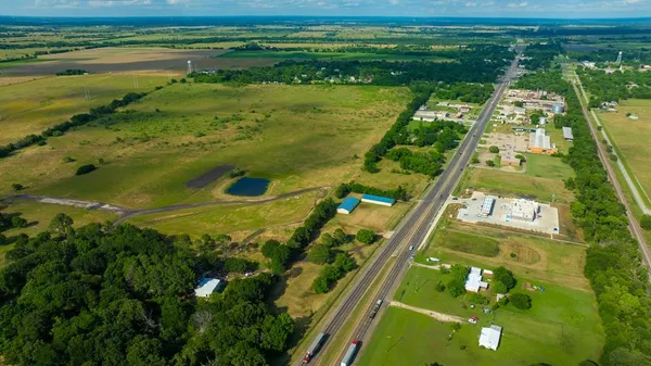 a view of a pool with a yard