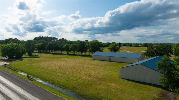 a view of a swimming pool with a lake view and mountain view