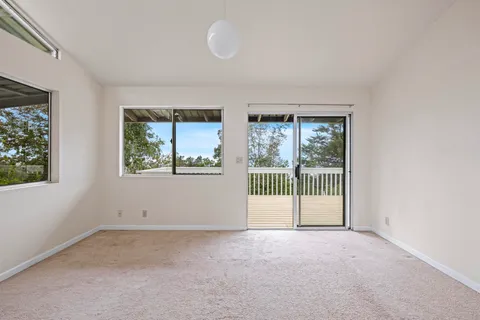 a view of a room with large window