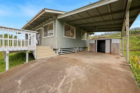 a view of a house with a large space