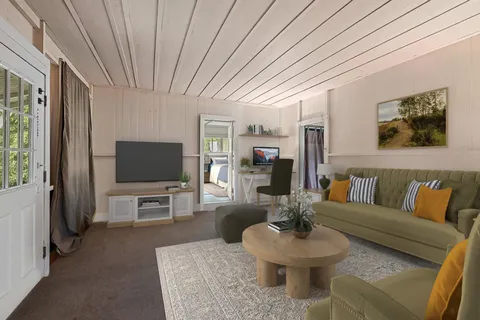 a living room with furniture a flat screen tv and a large window