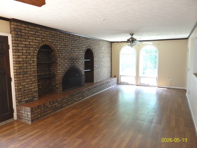 6730 Ranch Forest Drive Columbus, GA 31904 - Photo 4 of 17 a view of a livingroom with wooden floor and a ceiling fan