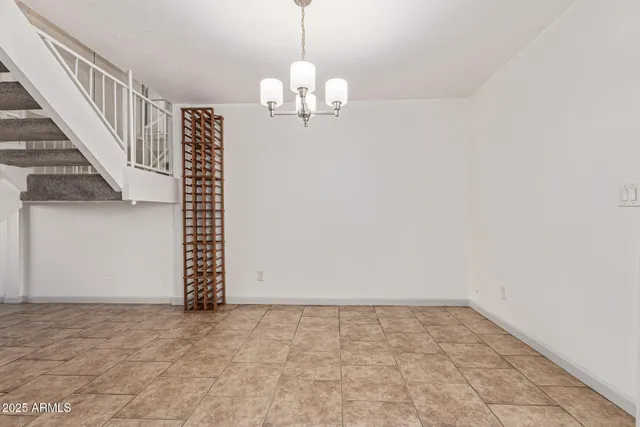 a view of a room with a chandelier