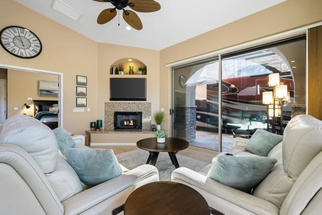 a large kitchen with a large window and a sink