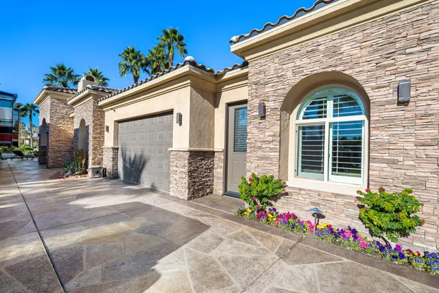 a view of a city with mountains in the background