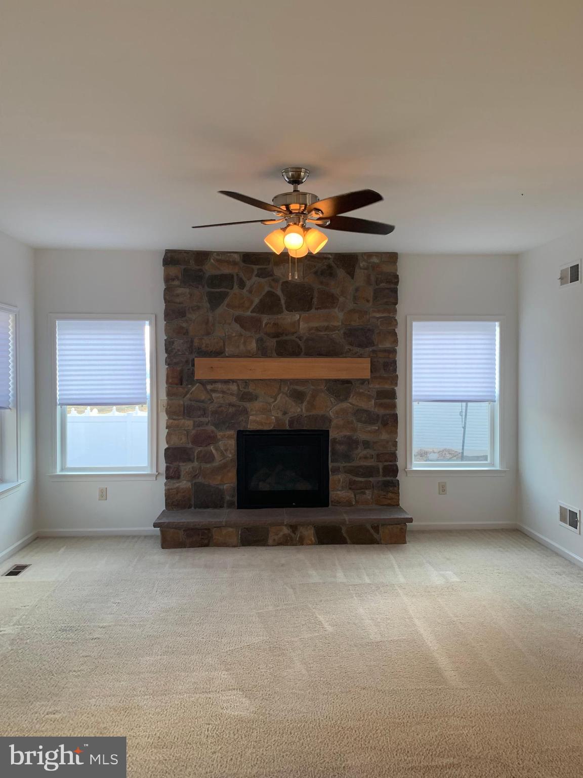154 Spring Meadows Road Manchester, PA 17345 - Photo 11 of 48 Living Room Stone Fireplace