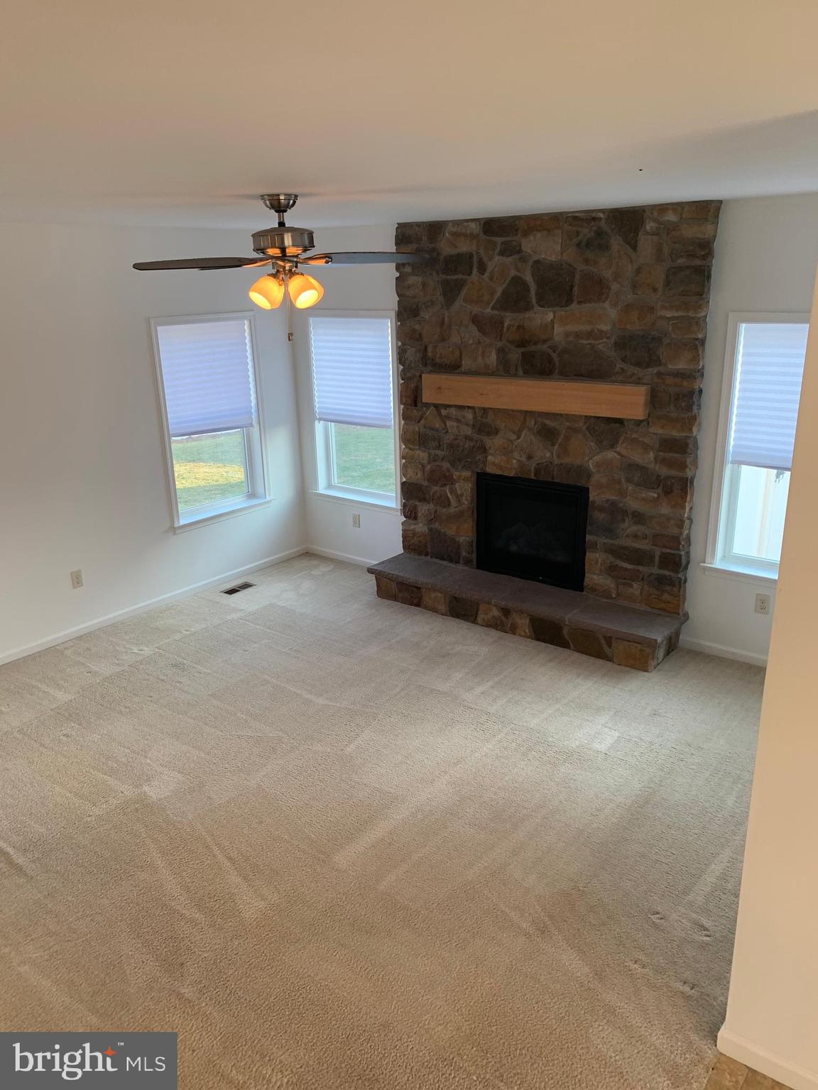 154 Spring Meadows Road Manchester, PA 17345 - Photo 43 of 48 living room firepalce