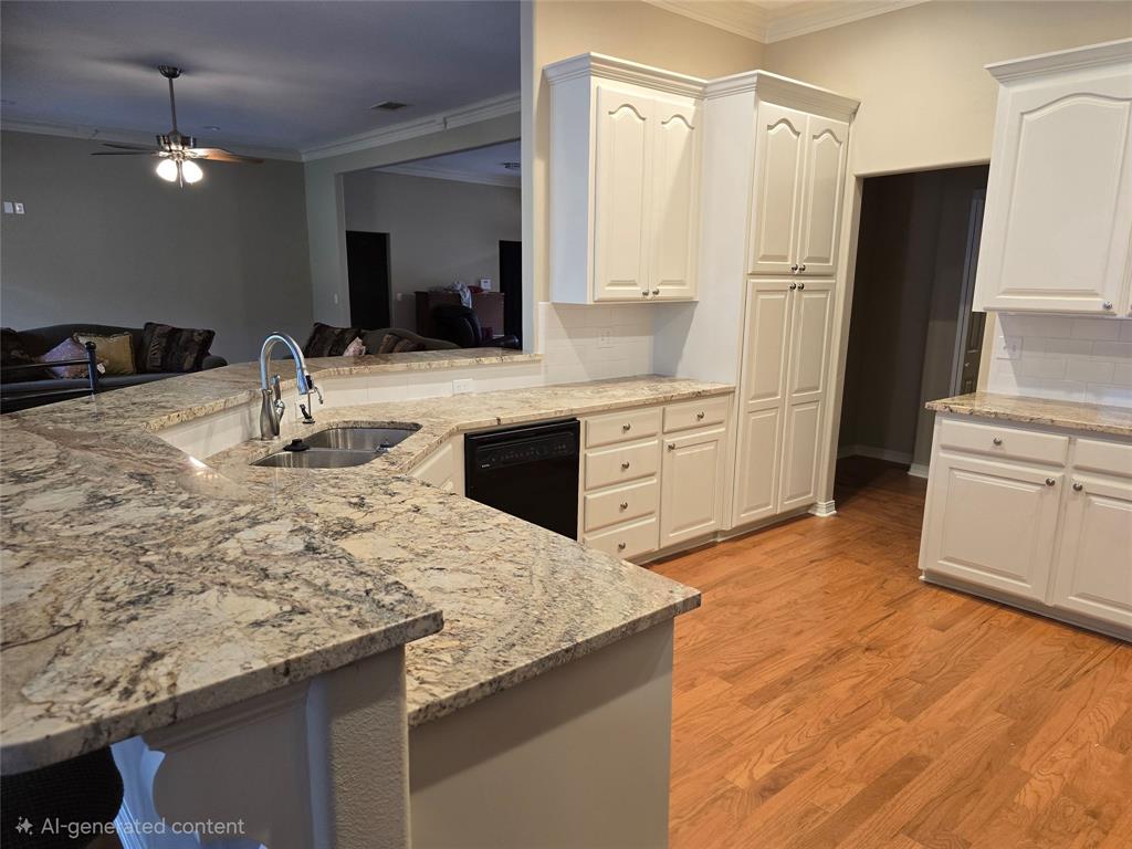 10407 Bethany State Line Road Bethany, LA 71007 - Photo 6 of 19 a kitchen with stainless steel appliances granite countertop a sink and a refrigerator