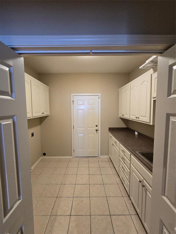 10407 Bethany State Line Road Bethany, LA 71007 - Photo 7 of 30 a spacious bathroom with a granite countertop sink and a mirror