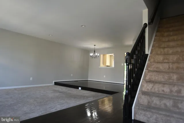 wooden floor with staircase