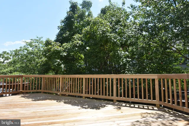 a view of a wooden fence