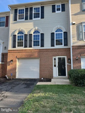 a view of building with yard