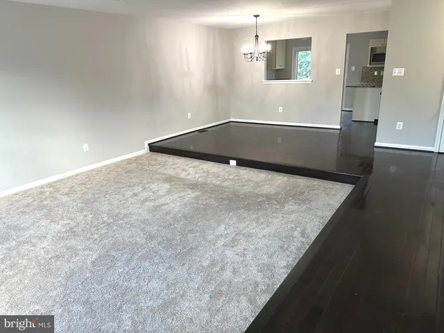 a view of wooden floor and staircase
