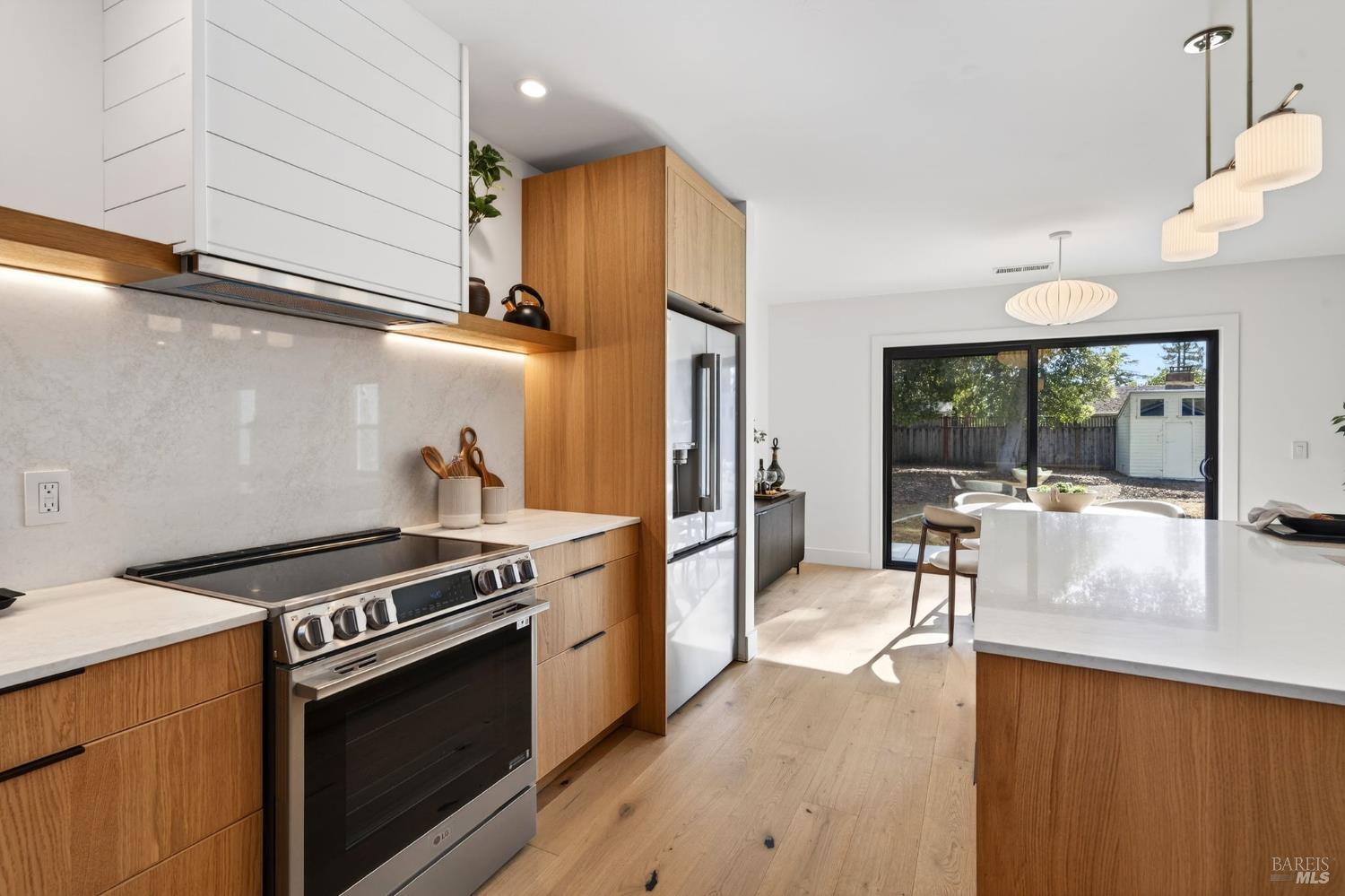 2034 Augustan Avenue Santa Rosa, CA 95404 - Photo 10 of 29 Kitchen and dining area looking out to patio and backyard